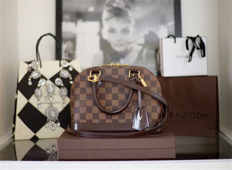 louis vuitton alma bb inside|louis vuitton alma bb outfits.